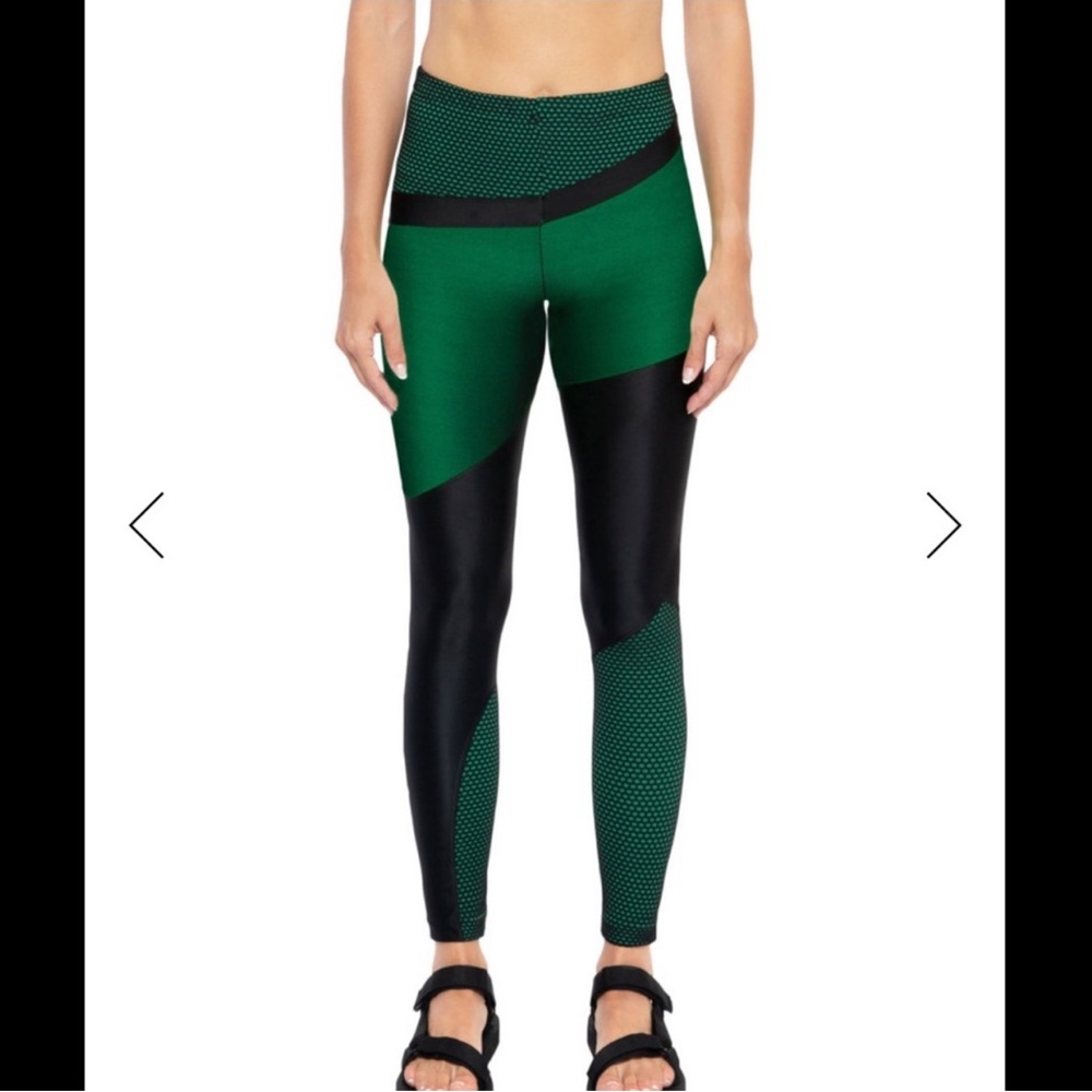 Koral leggings with lustrous fabric & mesh details throughout, size S. GUC